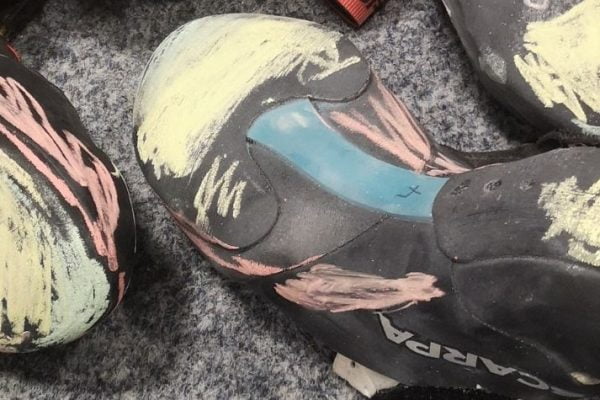 Types of Climbing 4 shoes covered in chalk