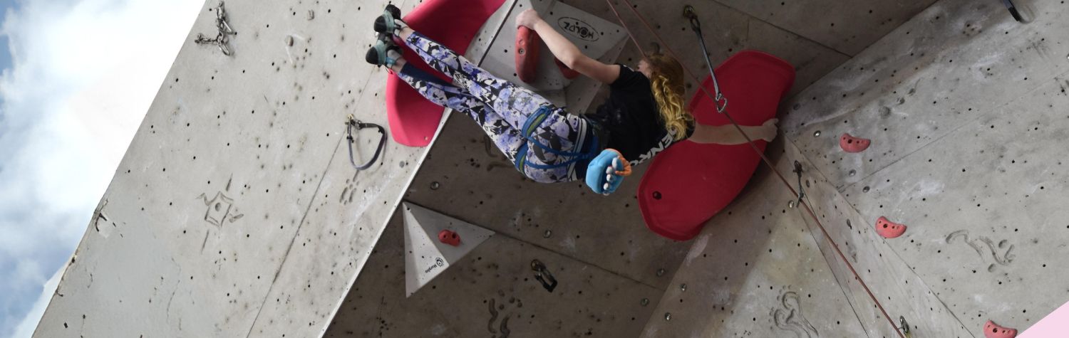 Young climber toe hooking